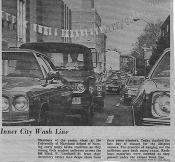 News Clipping of Uniforms strung across Lombard street