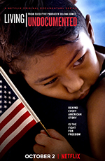 A girl being carried, holding an American Flag.