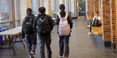 Students walking in a hallway