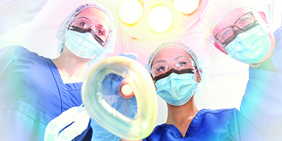 nurse anesthesia students with a mask