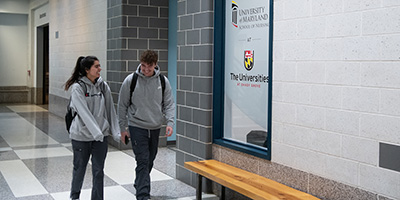 Students walking in a hallway at USG