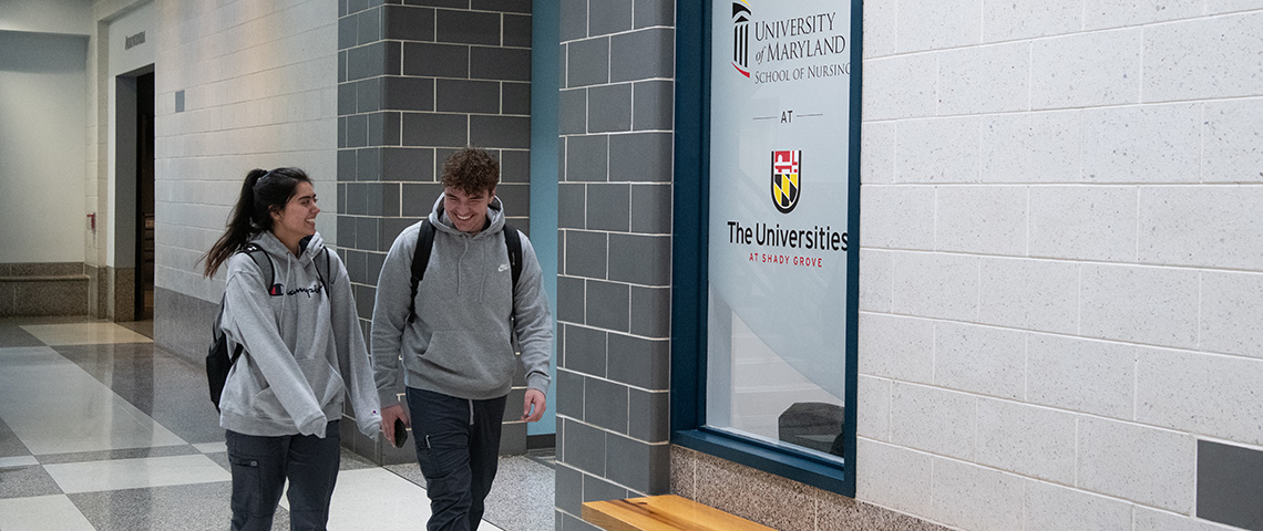 Students walking in a hallway at USG